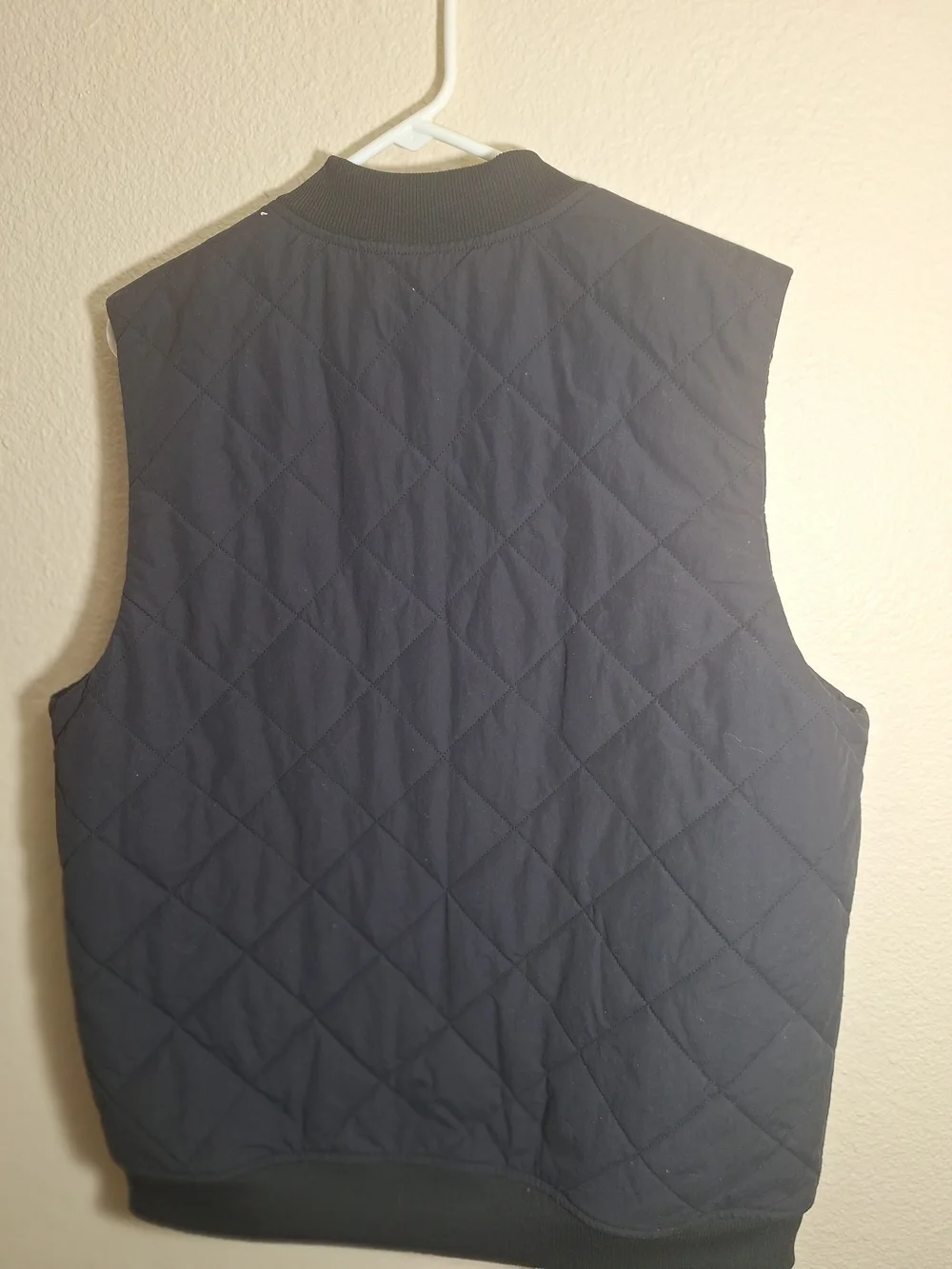 The North Face Black Quilted Vest with Sherpa Lining